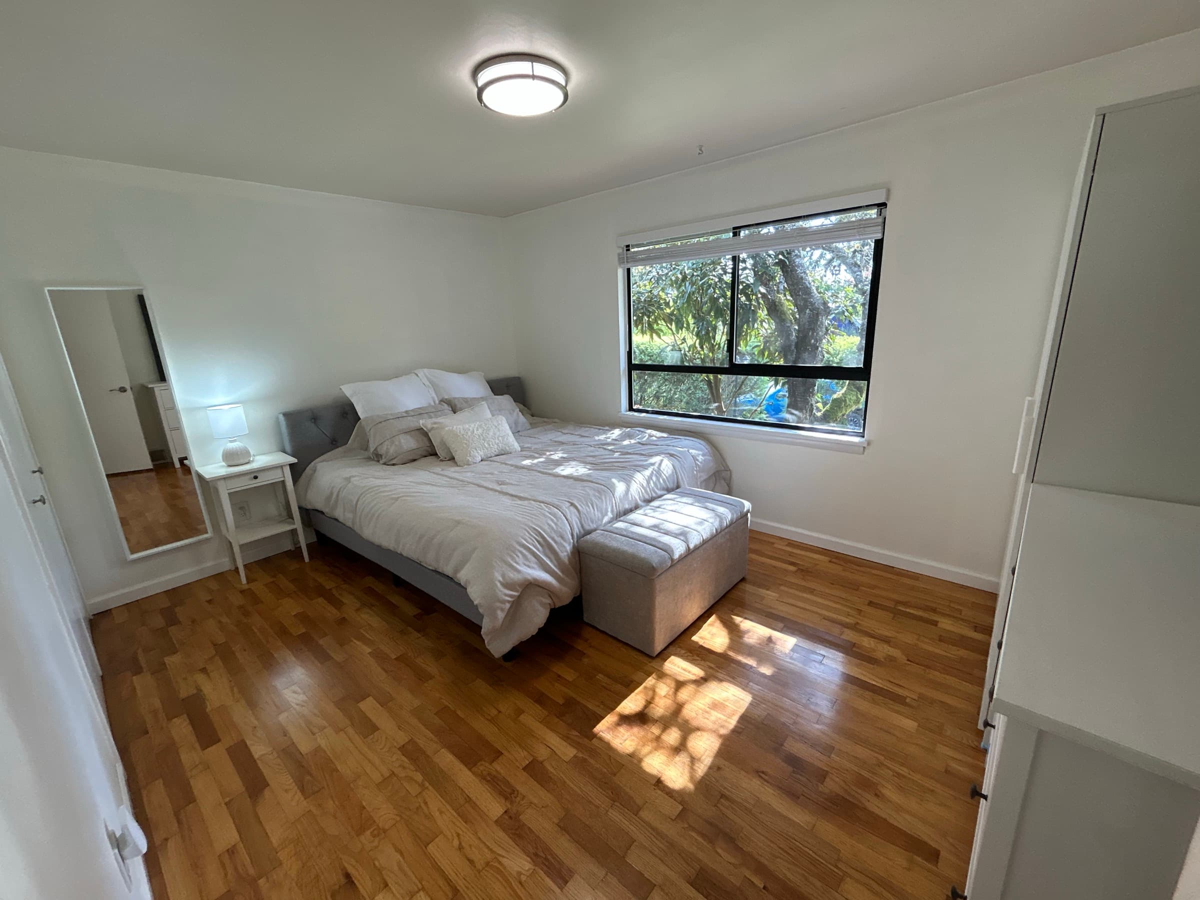 Upstairs bedroom with garden view